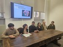 conferenza m5s e foto cani uccisi